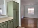 Kitchen pantry with open floor plan to living area at 9236 Canalino Dr, Las Vegas, NV 89134