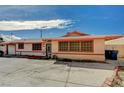 Charming single-story home featuring a spacious driveway with desert landscaping at 111 Narcissus Ln, Las Vegas, NV 89107