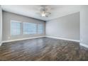 Bedroom with hardwood flooring, recessed lighting, and large windows at 11890 Tevare Ln # 1098, Las Vegas, NV 89138