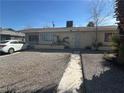 Cozy single-story home featuring a gravel yard and an inviting front entrance at 2108 E Ogden Ave, Las Vegas, NV 89101