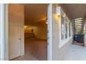 Inviting entryway offering a glimpse into a spacious living area with neutral tones at 2152 Turquoise Ridge St # 105, Las Vegas, NV 89117