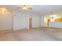 Bright living room with an open layout, seamlessly connecting to the kitchen area at 2152 Turquoise Ridge St # 105, Las Vegas, NV 89117