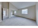 Spacious bedroom offers comfortable carpet, natural light, and closet at 331 Seine Way # 331, Henderson, NV 89014