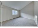 Well-lit bedroom with neutral carpeting and a mirrored closet at 331 Seine Way # 331, Henderson, NV 89014