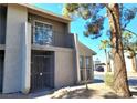 Charming two-story home with a well-kept exterior and secure gated entry at 530 Sellers Pl, Henderson, NV 89011