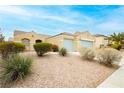 Attractive one-story home featuring low-maintenance landscaping and a charming facade in a sunny locale at 187 Golden Crown Ave, Henderson, NV 89002