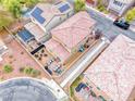Aerial view of a private fenced backyard featuring desert landscaping and outdoor seating area at 3767 Westeros Landing Ave, Las Vegas, NV 89141