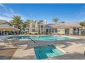 Large community pool with hot tub and seating area, perfect for relaxation and enjoyment at 3924 Quiet Pine St # 201, Las Vegas, NV 89108