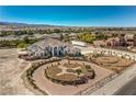 Expansive home with circular drive, decorative landscaping and mountain views from this luxury community at 7025 N Eula St, Las Vegas, NV 89149