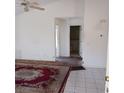 The living room features neutral paint, ceiling fan, and transition to the bathroom at 746 Anne Ln, Henderson, NV 89015