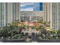 Beautiful Mediterranean-style building between condo towers boasts lush landscaping, entrance and porte cochere at 2777 Paradise Rd # 607, Las Vegas, NV 89109