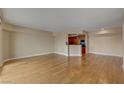 Bright, expansive living area features beautiful hardwood flooring and neutral walls at 2777 Paradise Rd # 607, Las Vegas, NV 89109