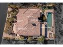 Unique aerial view of the property layout, showcasing the pool, putting green, and outdoor kitchen at 30 Meadowhawk Ln, Las Vegas, NV 89135