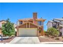 Charming two-story home with a well-maintained front yard and attached two-car garage in a friendly neighborhood at 361 Tobler Dr, Las Vegas, NV 89145