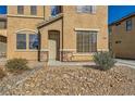 Inviting front entrance with stylish desert landscaping and stone accents at 5024 Stone Bay Ave, Las Vegas, NV 89131