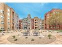 Courtyard seating for relaxing outside at 56 E Serene Ave # 306, Las Vegas, NV 89123