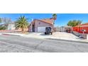 Attractive single-Gathering house with a desert landscape featuring an ample driveway and attached garage at 637 Del Prado Dr, Boulder City, NV 89005