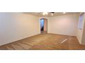 Spacious living room with wall-to-wall carpet and an arched hallway at 8120 Finch Feather St, Las Vegas, NV 89143