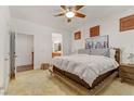 Bright main bedroom with ensuite bathroom and modern furnishings at 9050 W Tropicana Ave # 1102, Las Vegas, NV 89147