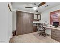Functional home office with built-in desk and storage at 9050 W Tropicana Ave # 1102, Las Vegas, NV 89147