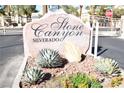Stone Canyon Silverado community sign with lush landscaping and desert plants at 9672 Gunsmith Dr, Las Vegas, NV 89123