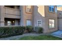 Close up of building exterior featuring manicured landscaping and building number at 1150 N Buffalo Dr # 1015, Las Vegas, NV 89128