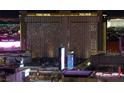 The Park MGM hotel exterior illuminated at night, highlighting its grand facade at 145 E Harmon Ave # 2917, Las Vegas, NV 89109