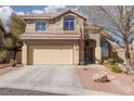 Charming two-story home with a two-car garage, tidy landscaping, and mature shade tree at 1501 Scenic Peak St, Las Vegas, NV 89144