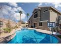 Beautiful backyard pool with spa, patio area, and privacy wall, perfect for outdoor enjoyment at 1501 Scenic Peak St, Las Vegas, NV 89144
