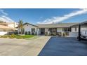 Well-manicured front yard featuring a modern walkway leading to the inviting front entrance at 2870 Belcastro St, Las Vegas, NV 89117