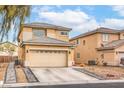Charming two-story house featuring a spacious two-car garage with concrete driveway and low maintenance landscaping at 3916 Otter Corner Ct, Las Vegas, NV 89122