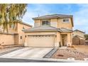 Beautiful two-story home featuring a spacious two-car garage and a low maintenance landscaped front yard at 3916 Otter Corner Ct, Las Vegas, NV 89122