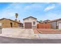 Single-story home with a desert landscape and a private driveway at 4153 Broadriver Dr, Las Vegas, NV 89108