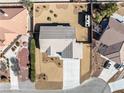 Aerial view of a well maintained property with a large backyard and long driveway at 5450 Barnwood Ct, Pahrump, NV 89061