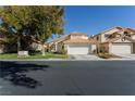 Charming two-story home with a well-maintained lawn and a two-car garage at 5452 Big Sky Ln, Las Vegas, NV 89149