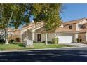 Charming two-story home with a well-maintained lawn and a two-car garage at 5452 Big Sky Ln, Las Vegas, NV 89149