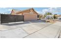 Charming single-story home with low-maintenance desert landscaping and two car garage in a quiet neighborhood at 7621 Gosport Ave, Las Vegas, NV 89131