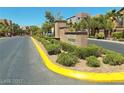 Welcoming entrance sign to the Indigo community with manicured landscaping at 9359 Brigham Ave, Las Vegas, NV 89178