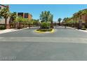 Gated entrance to the Indigo community with lush landscaping at 9359 Brigham Ave, Las Vegas, NV 89178