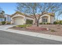 Attractive single-story house showcasing a two-car garage and tidy front yard at 9920 Netherton Dr, Las Vegas, NV 89134