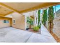 Exterior of condo shows covered parking, landscaping, and private entrance at 1817 Cutlass Dr # 0, Henderson, NV 89014