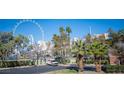 View of the parking lot in front of the condo, with High Roller in the background at 220 E Flamingo Rd # 129, Las Vegas, NV 89169