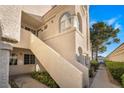 Exterior angle featuring the stairs and stucco exterior at 2251 Wigwam Pkwy # 923, Henderson, NV 89074