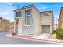 Charming two-story home with a stucco exterior and an attached garage in a residential neighborhood at 5246 Aurora Beam Ave, Las Vegas, NV 89122