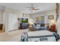 Bright living room with a ceiling fan and sliding glass door at 8000 Badura Ave # 1007, Las Vegas, NV 89113