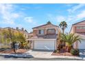 Attractive two-story home with desert landscaping and ample parking space at 8005 Dover Shores Ave, Las Vegas, NV 89128