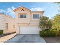 Beautiful two-story home featuring a well-maintained exterior, two-car garage, and landscaped front yard at 8729 Country View Ave, Las Vegas, NV 89129