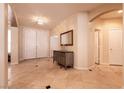 Bright foyer with chandelier, double door entry, and tiled flooring at 1313 Gallery Oaks Dr, Las Vegas, NV 89123