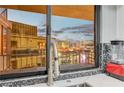 Fantastic outdoor view of the city through the window and a red-colored blender on the countertop at 205 E Harmon Ave # 1010, Las Vegas, NV 89169