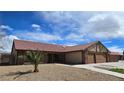 Charming single-story home featuring a well-maintained front yard and an attached two-car garage at 3407 Bristlecone St, Las Vegas, NV 89146